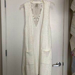 Winter white furry long vest with pockets and lace-looking back yoke